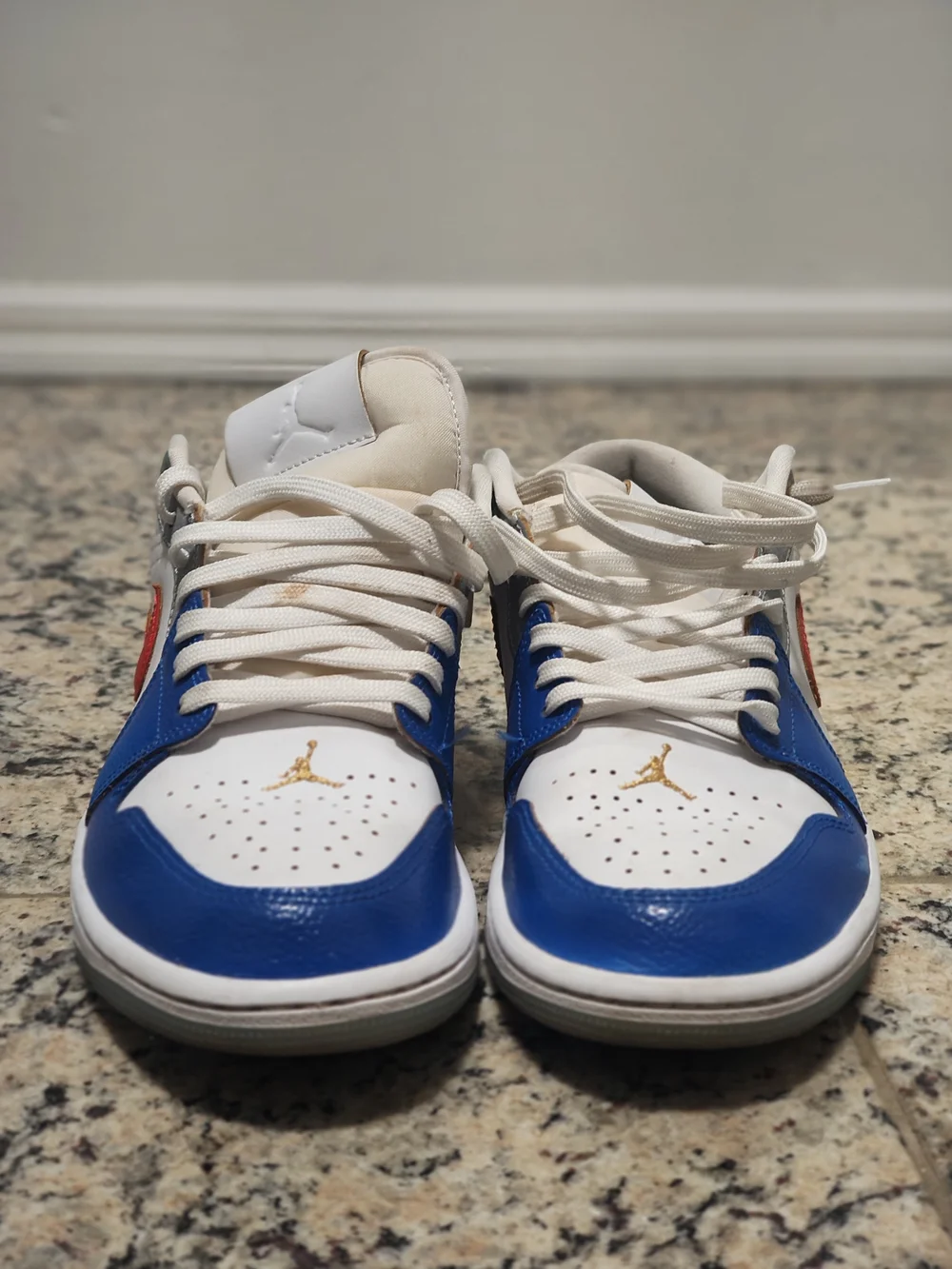 Jordan Men’s Low-Top Sneakers in White, Blue, Red